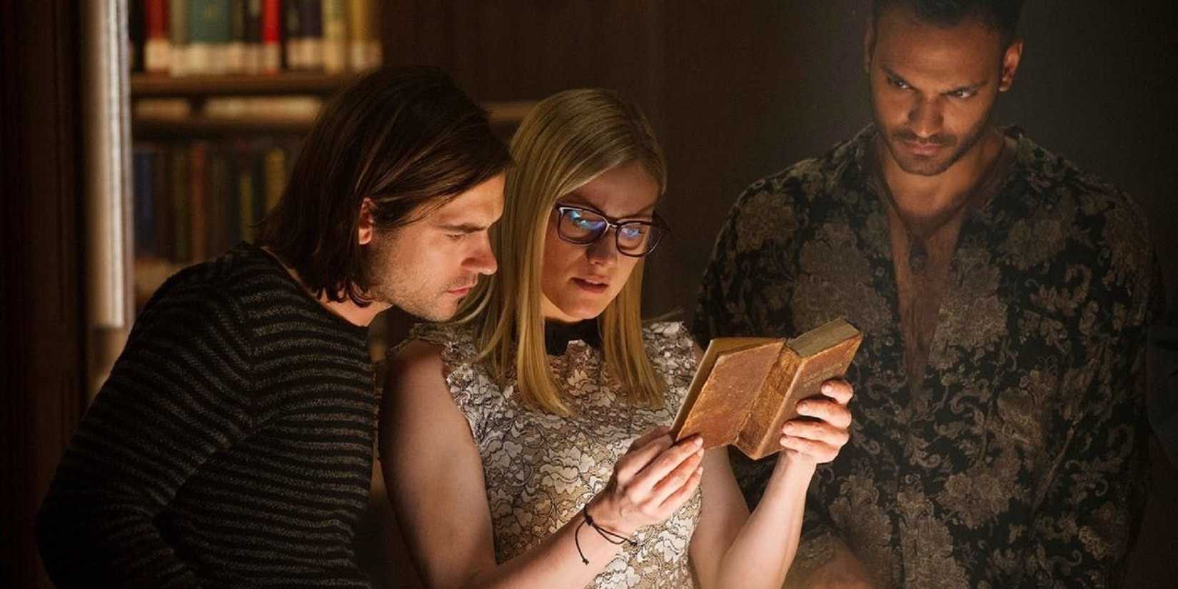 Quentin, Alice, and Penny reading a book in 'The Magicians.'