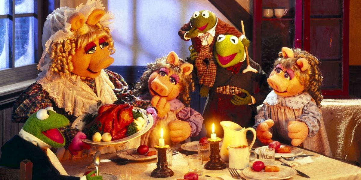 Miss Piggy, Kermit the Frog and the gang have dinner during The Muppet Christmas Carol