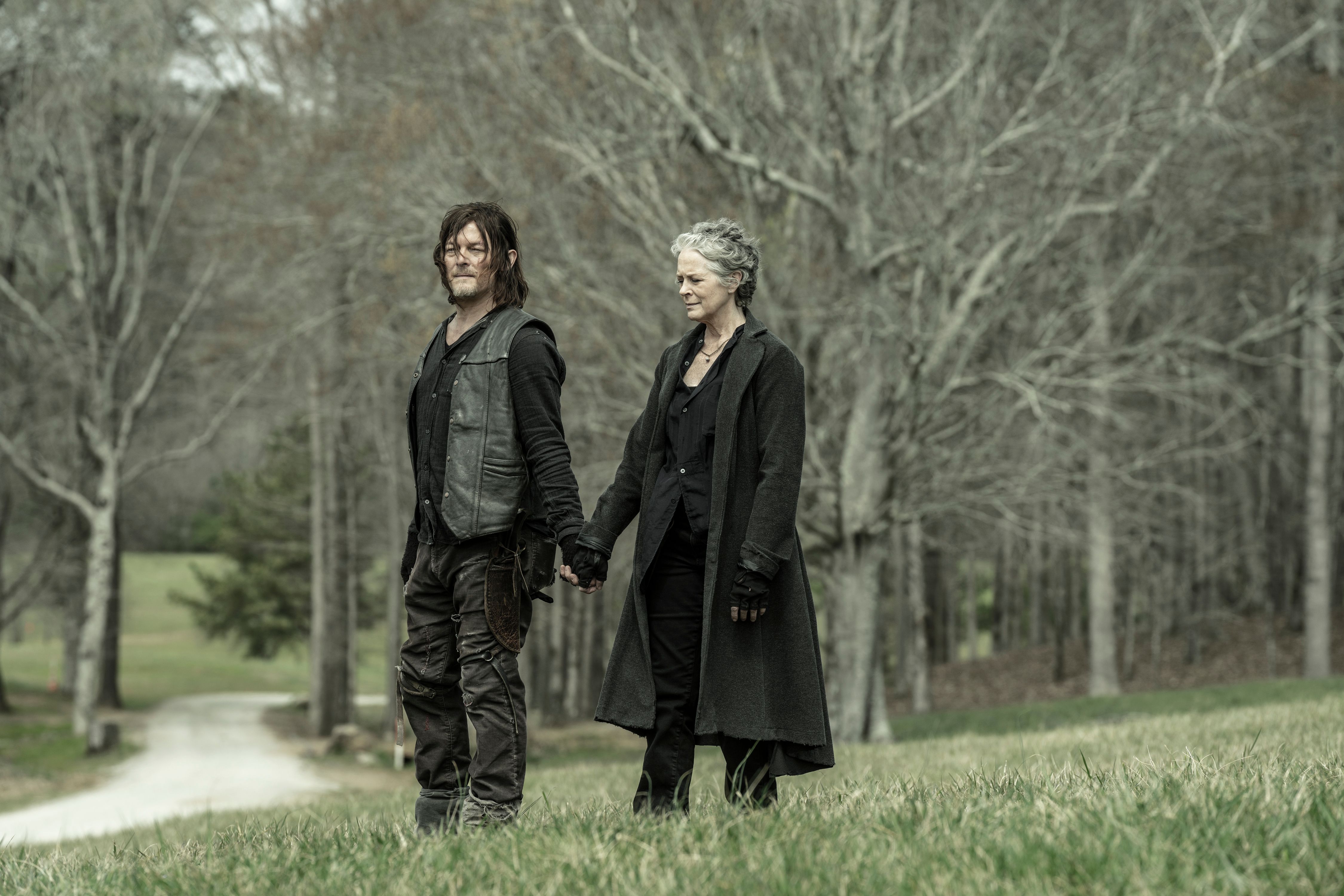 the walking dead series finale daryl norman reedus holding hands with carol melissa mcbride
