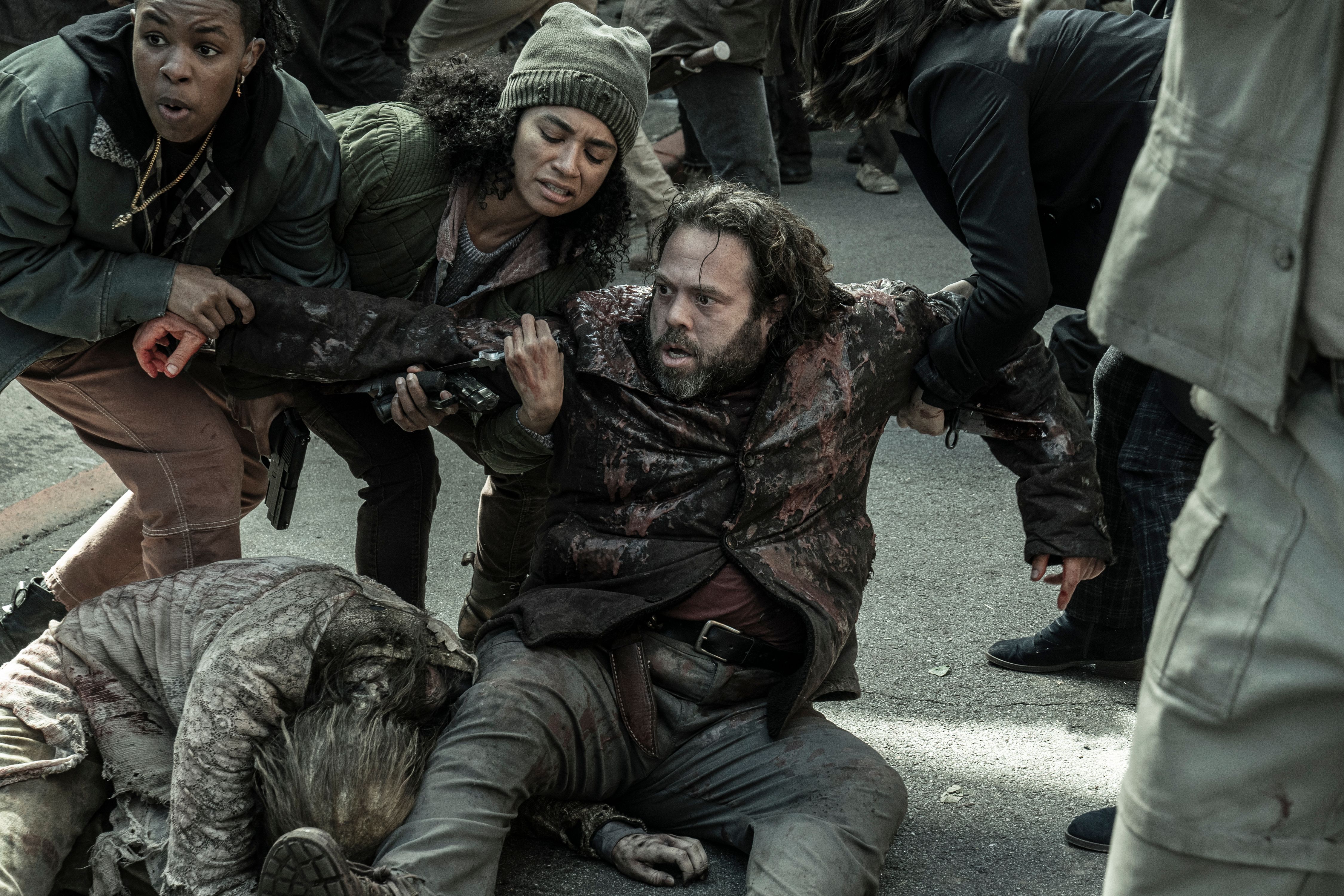 the walking dead series finale luke being saved from zombie attack