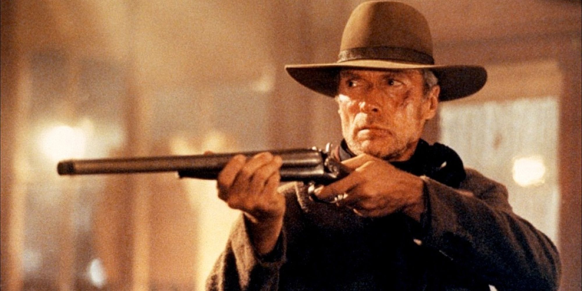 Clint Eastwood holding a rifle in Unforgiven