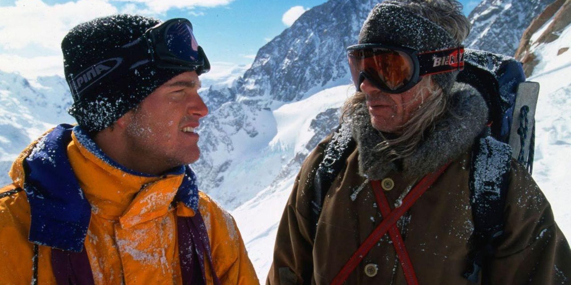 Two men conversing on a frozen mountain