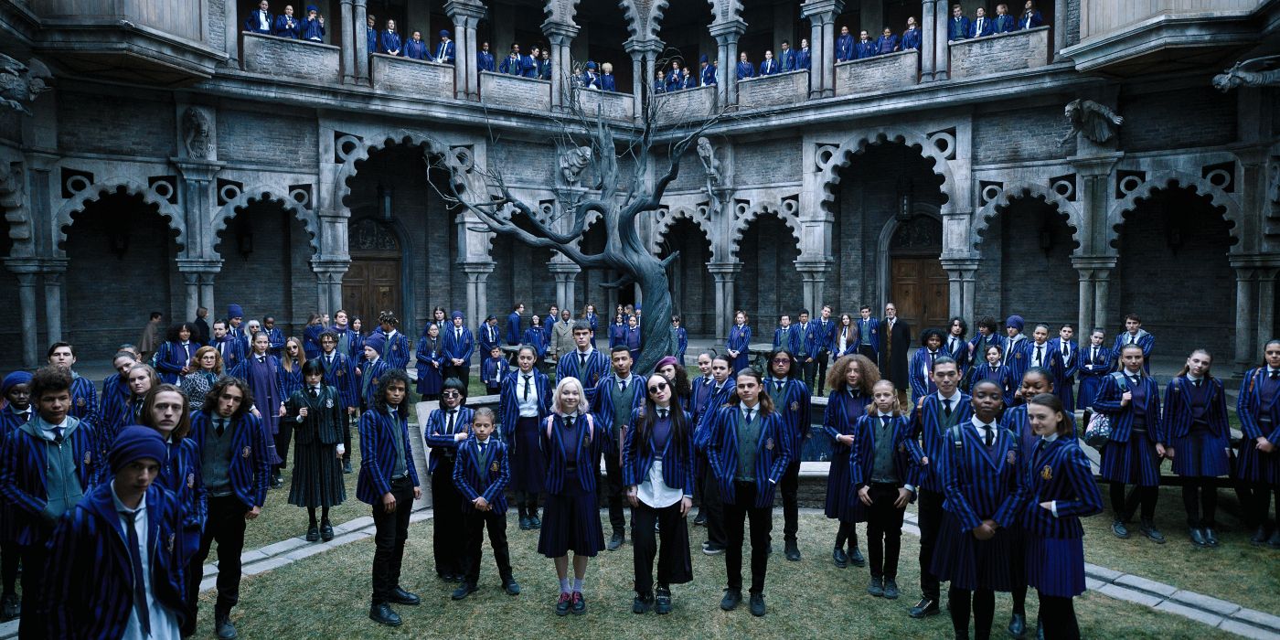 All the Nevermore students standing outside the school in their uniforms in Netflix's 'Wednesday'