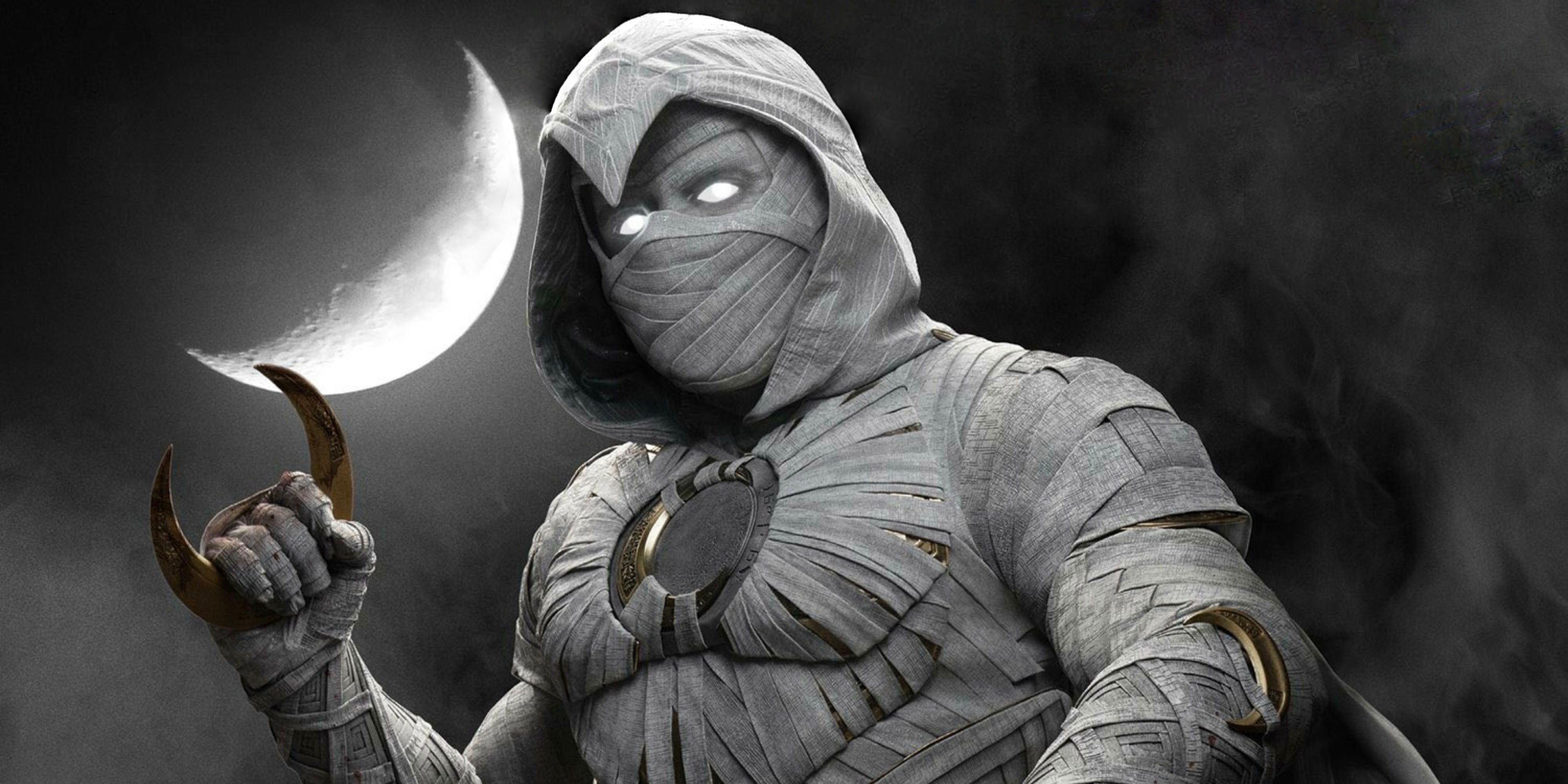 Moon Knight stands in front of a cloudy sky with a crescent moon.