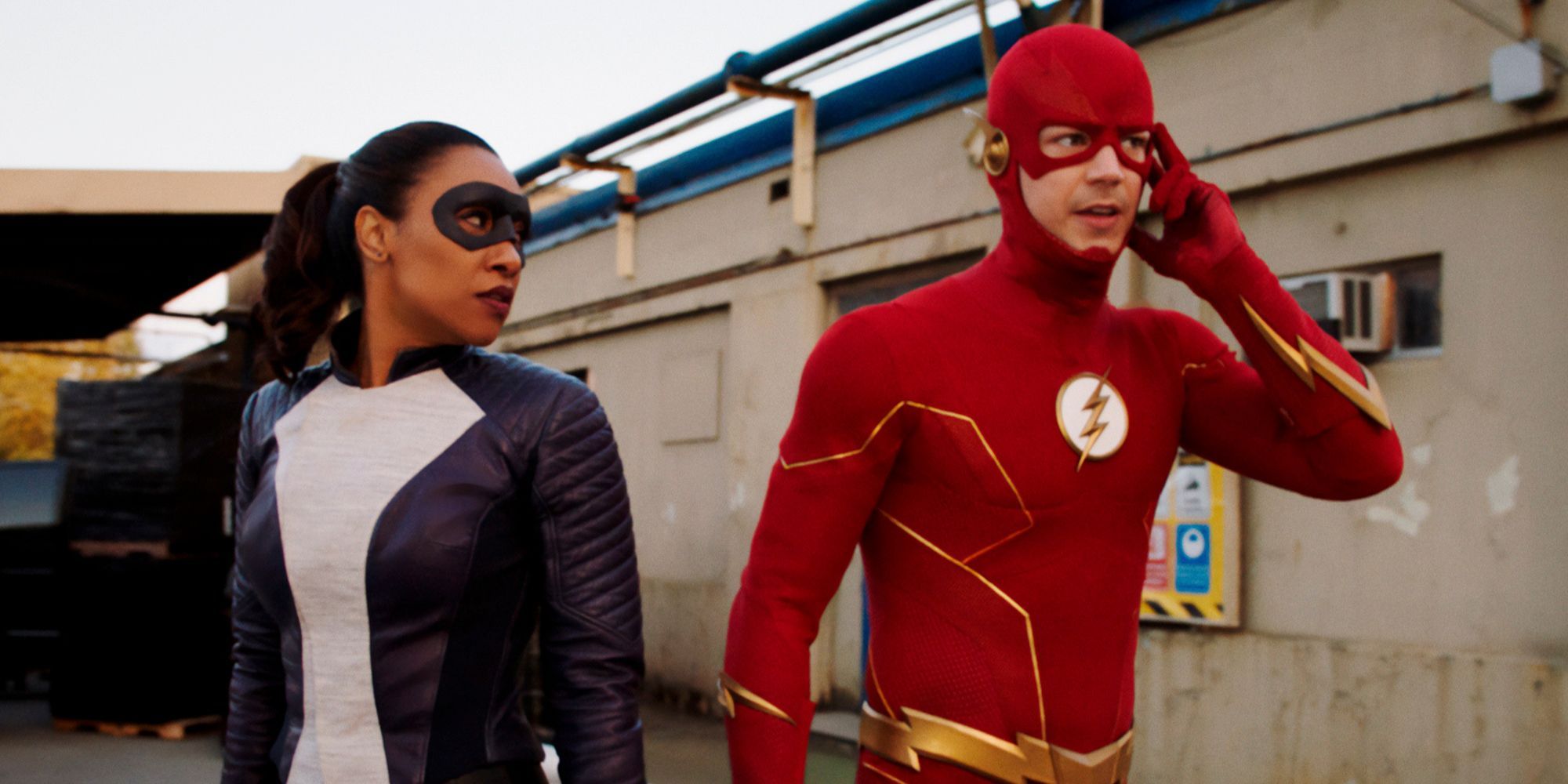 Iris and Barry from The Flash standing together