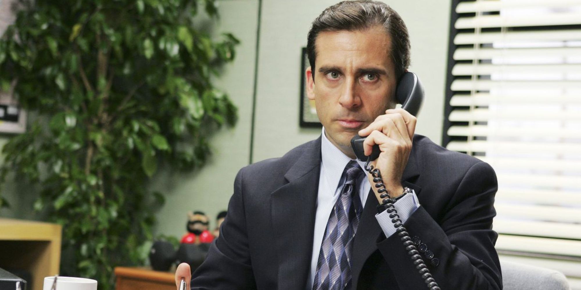 Michael Scott from The Office talking on the phone
