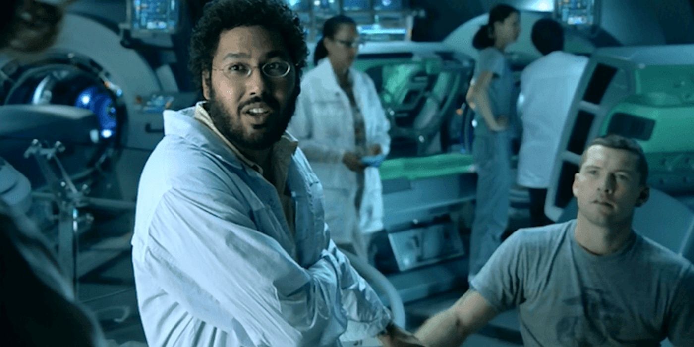 Dileep Rao as Dr. Max Patel and Sam Worthington as Jake Sully in Avatar