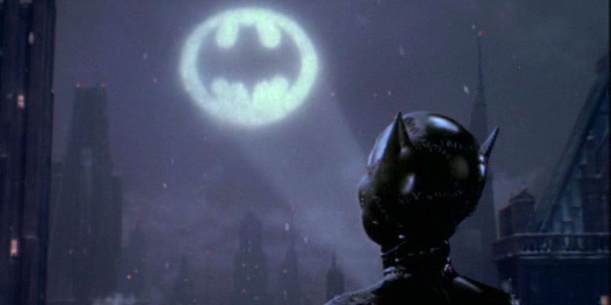 Catwoman looks up at bat signal in Tim Burton's Batman Returns