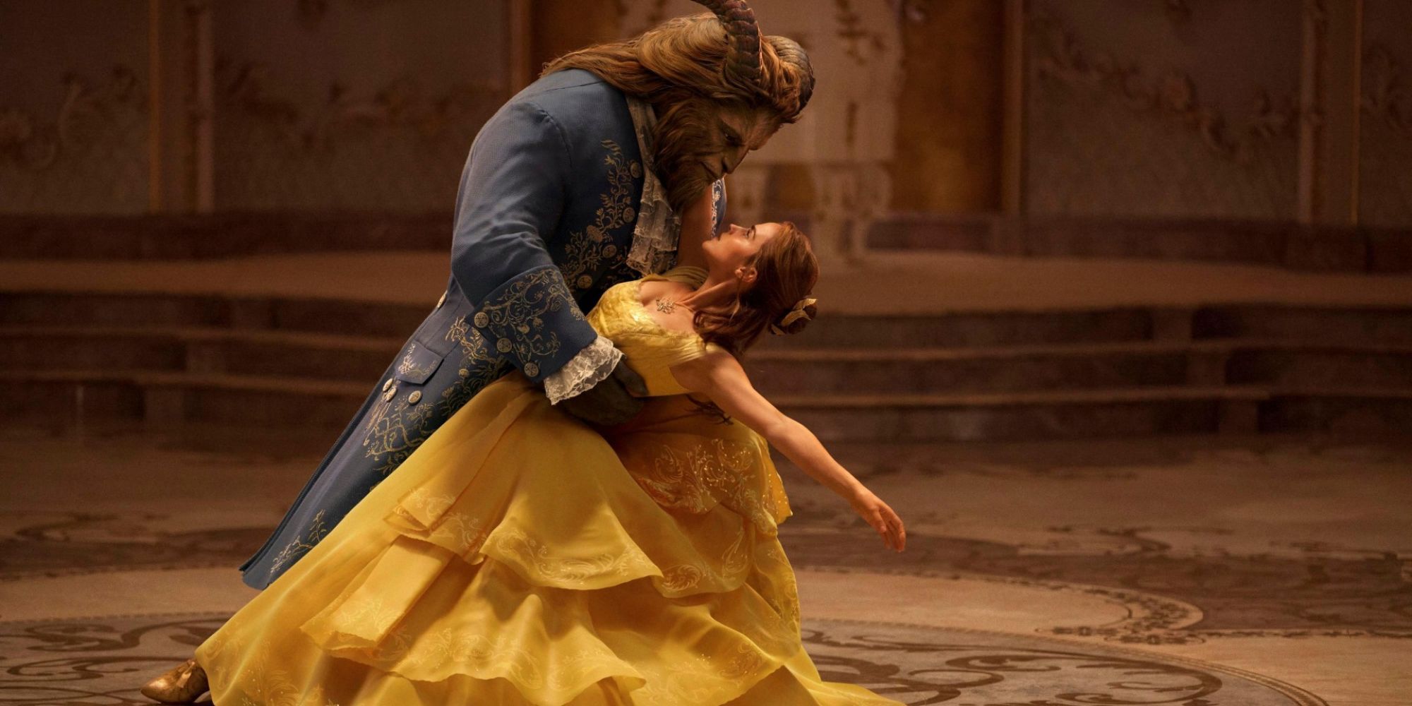Belle and the Beast dance in a ballroom
