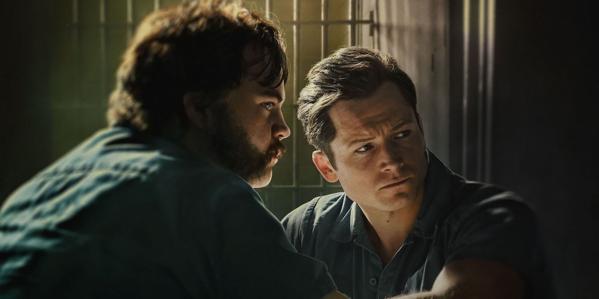 Taron Egerton and Paul W Hauser talking in jail in Black Bird