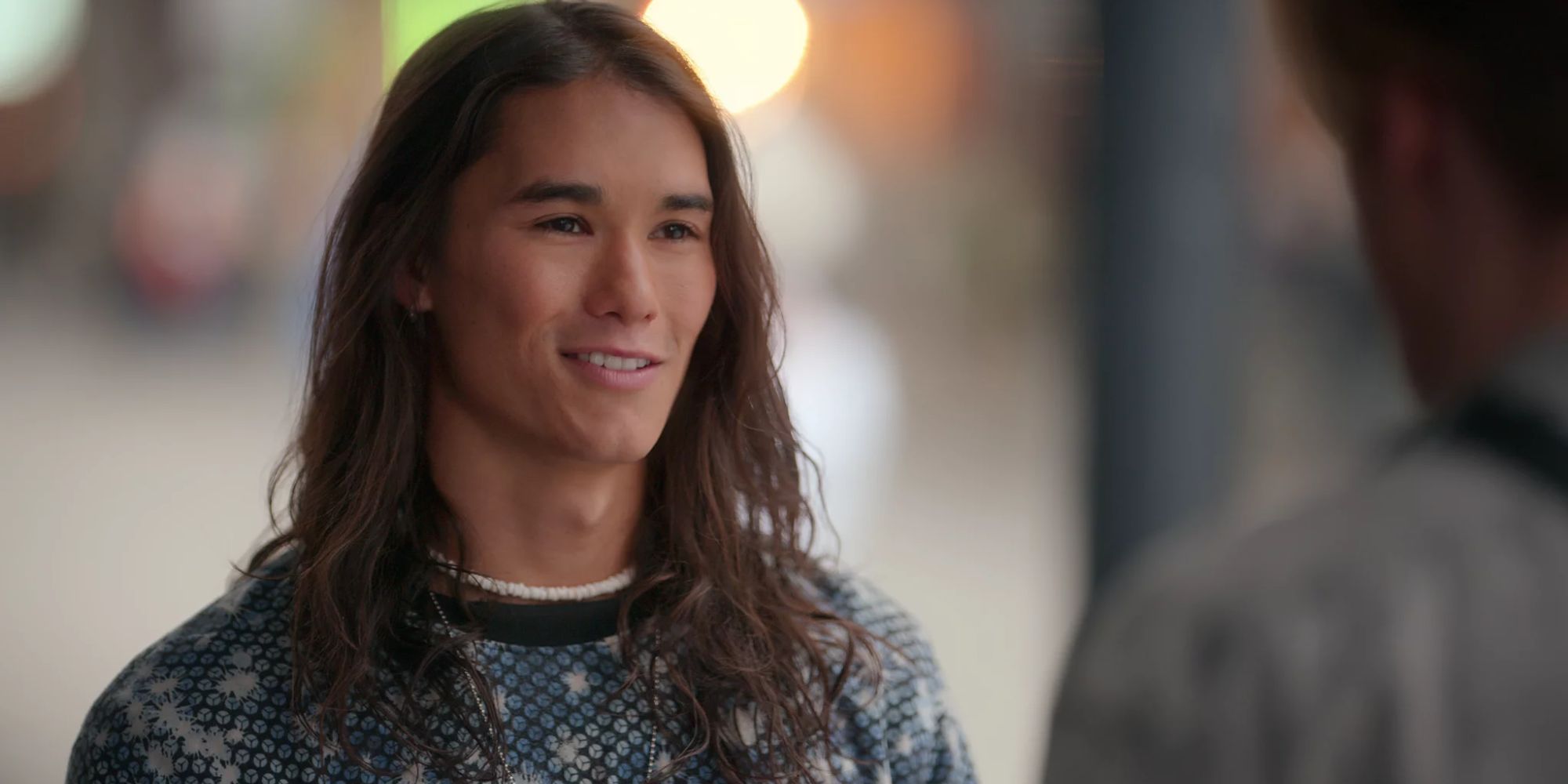 Booboo Stewart as Willie smiling at someone off-camera in Julie and the Phantoms