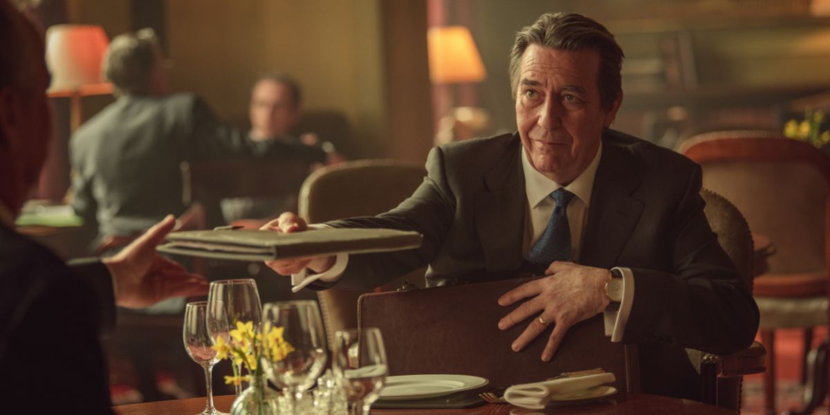 Ciaran Hinds in a suit in Treason