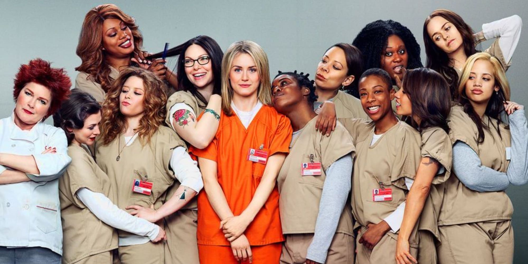 The cast of Orange Is The New Black posing for a group photo.