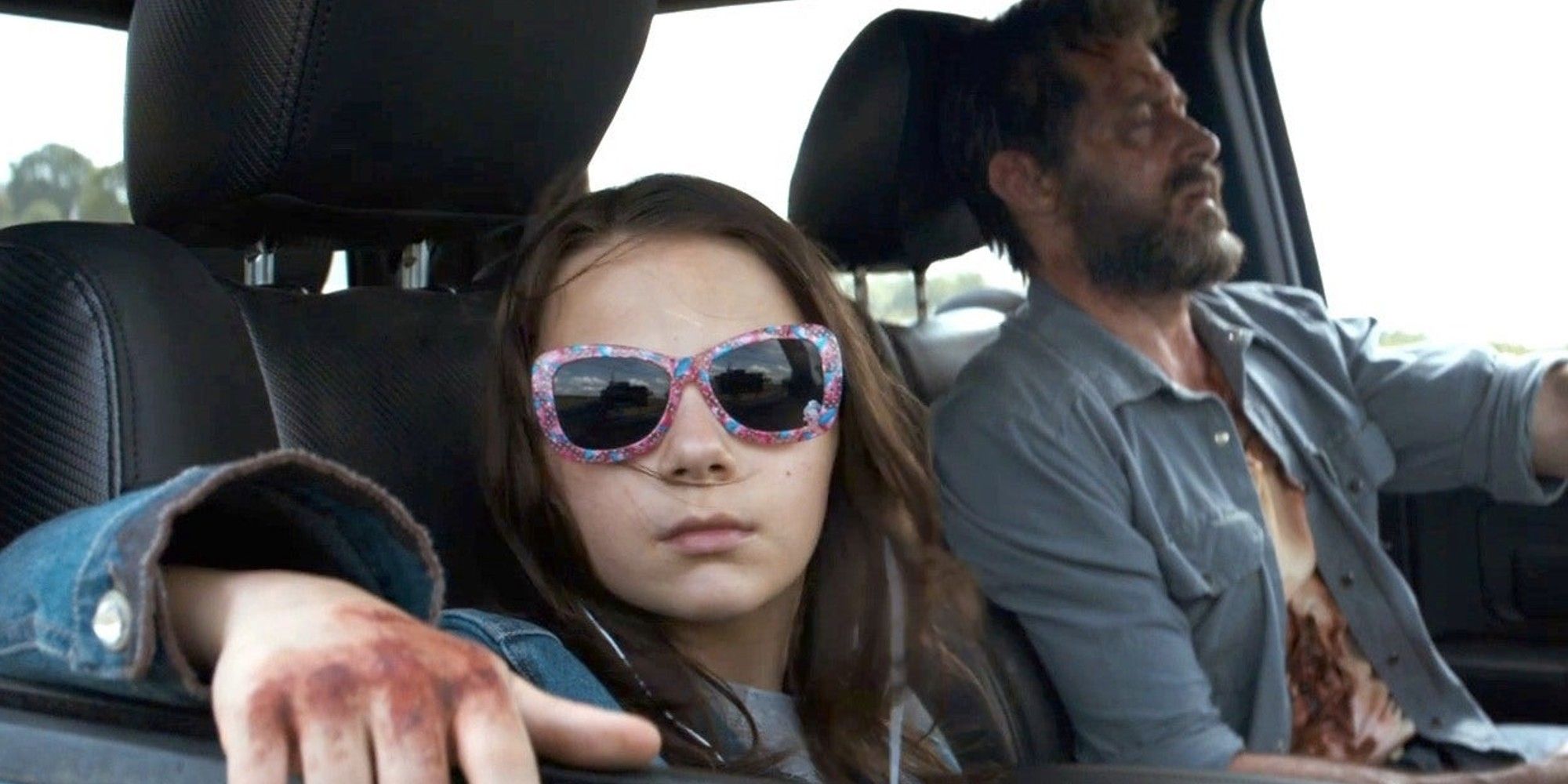 Dafne Keen and High Jackman in 'Logan'