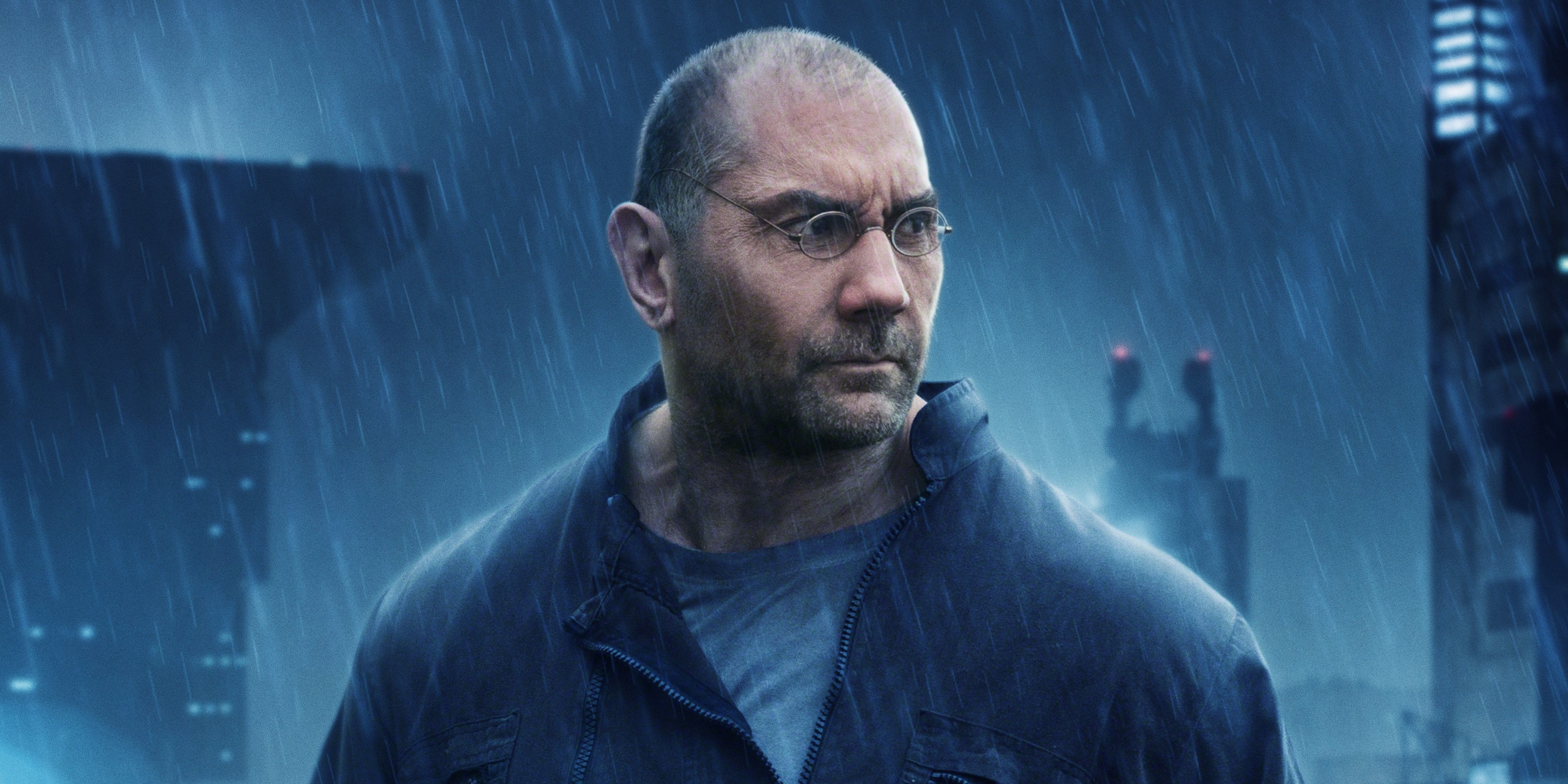 Poster for Blade Runner 2049 showing Dave Bautista under the rain and looking to his left.