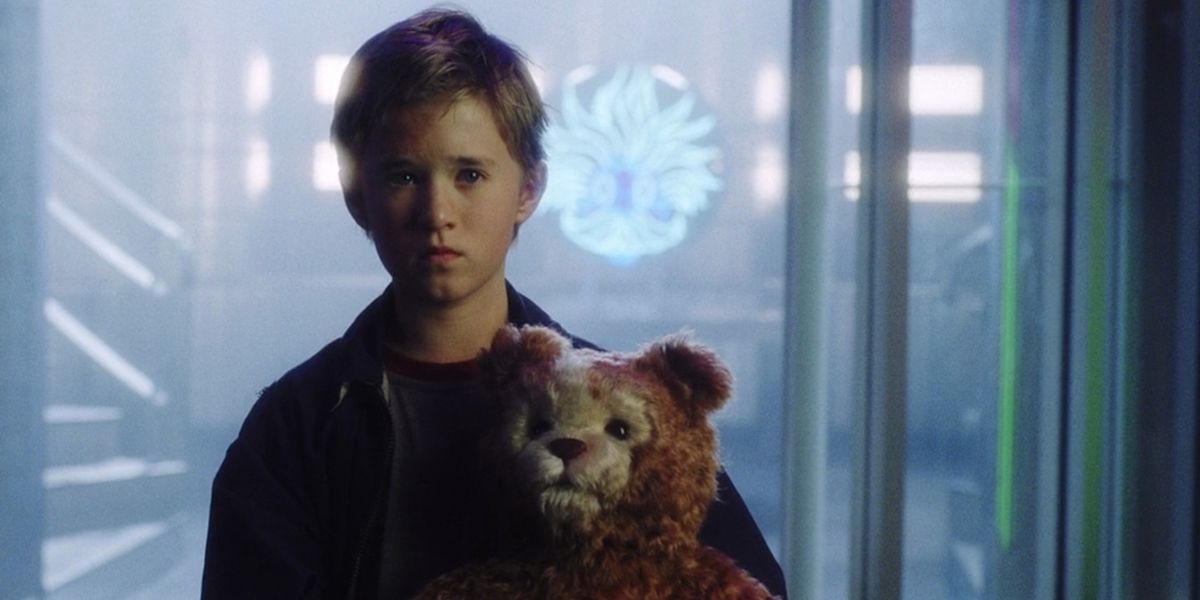 Haley Joel Osment as David holding a teddy bear in A.I.: Artificial Intelligence