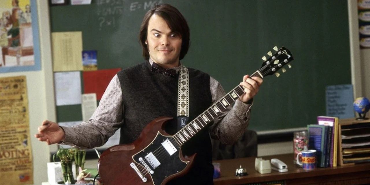 Jack Black as Dewey Finn playing the guitar in 'School Of Rock'