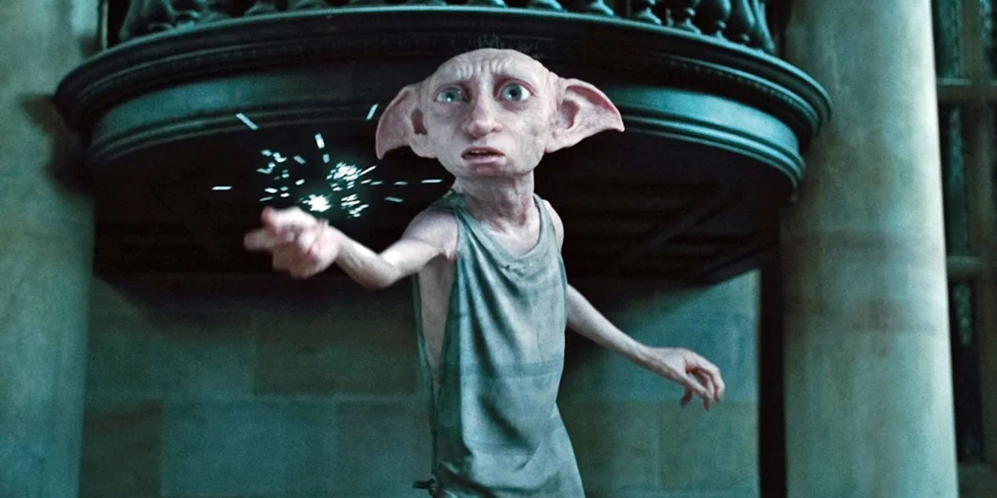 Magic is emitted from Dobby's fingers as he snaps in Harry Potter and the Deathyl Hallows Part 1