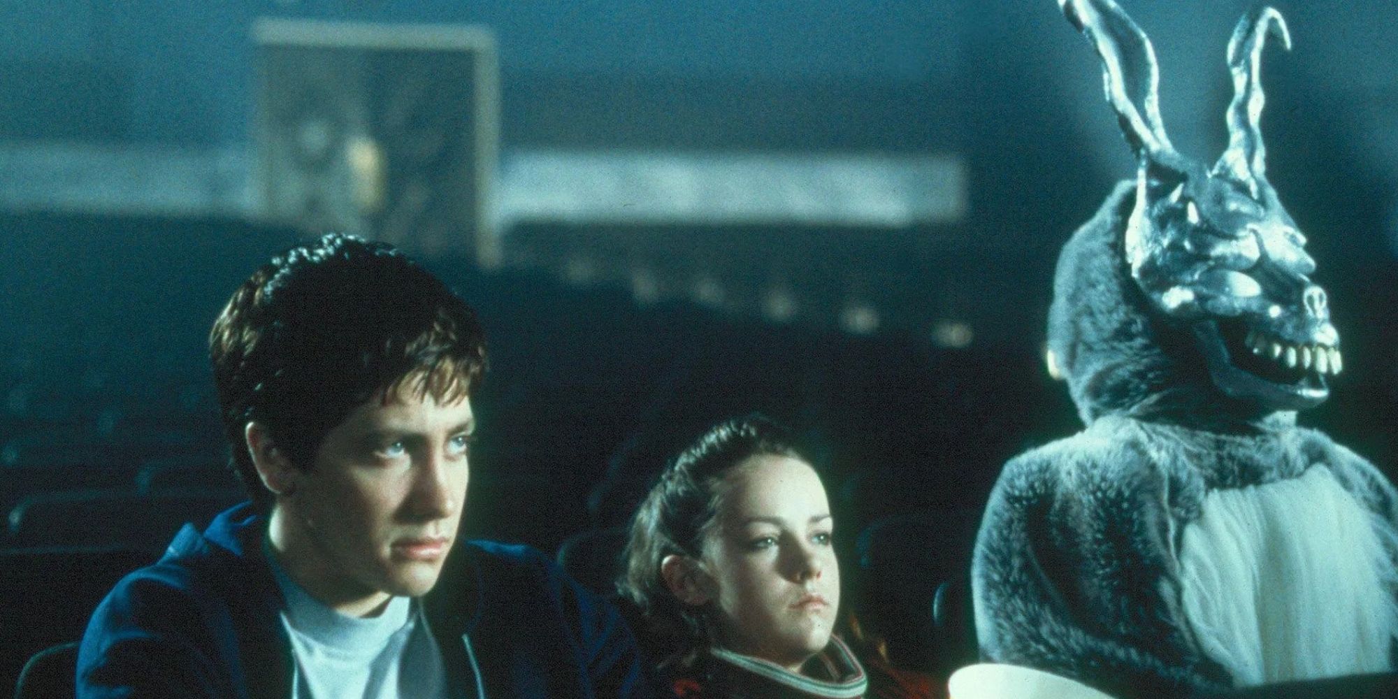 Donnie, Gretchen, and a rabbit at the movie theater in Donnie Darko'