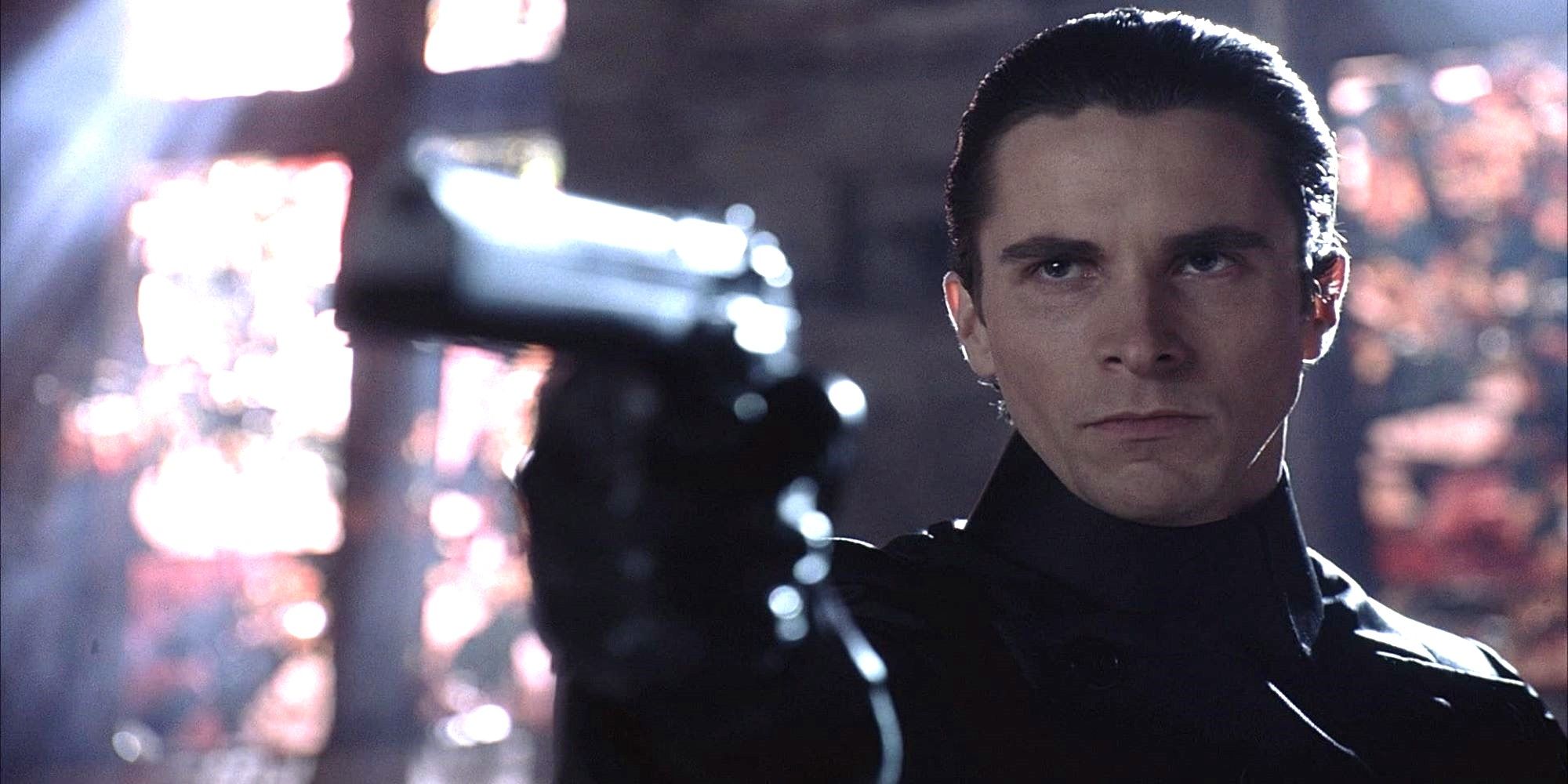 Christian Bale holding and pointing a gun in 'Equilibrium'