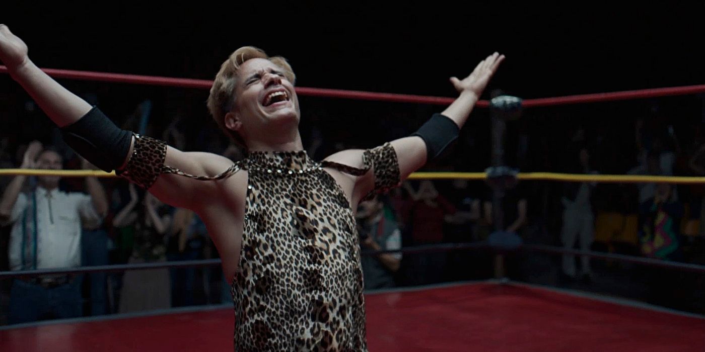 A male wrestler spreading his arms in joy on the ring in the film Cassandro.
