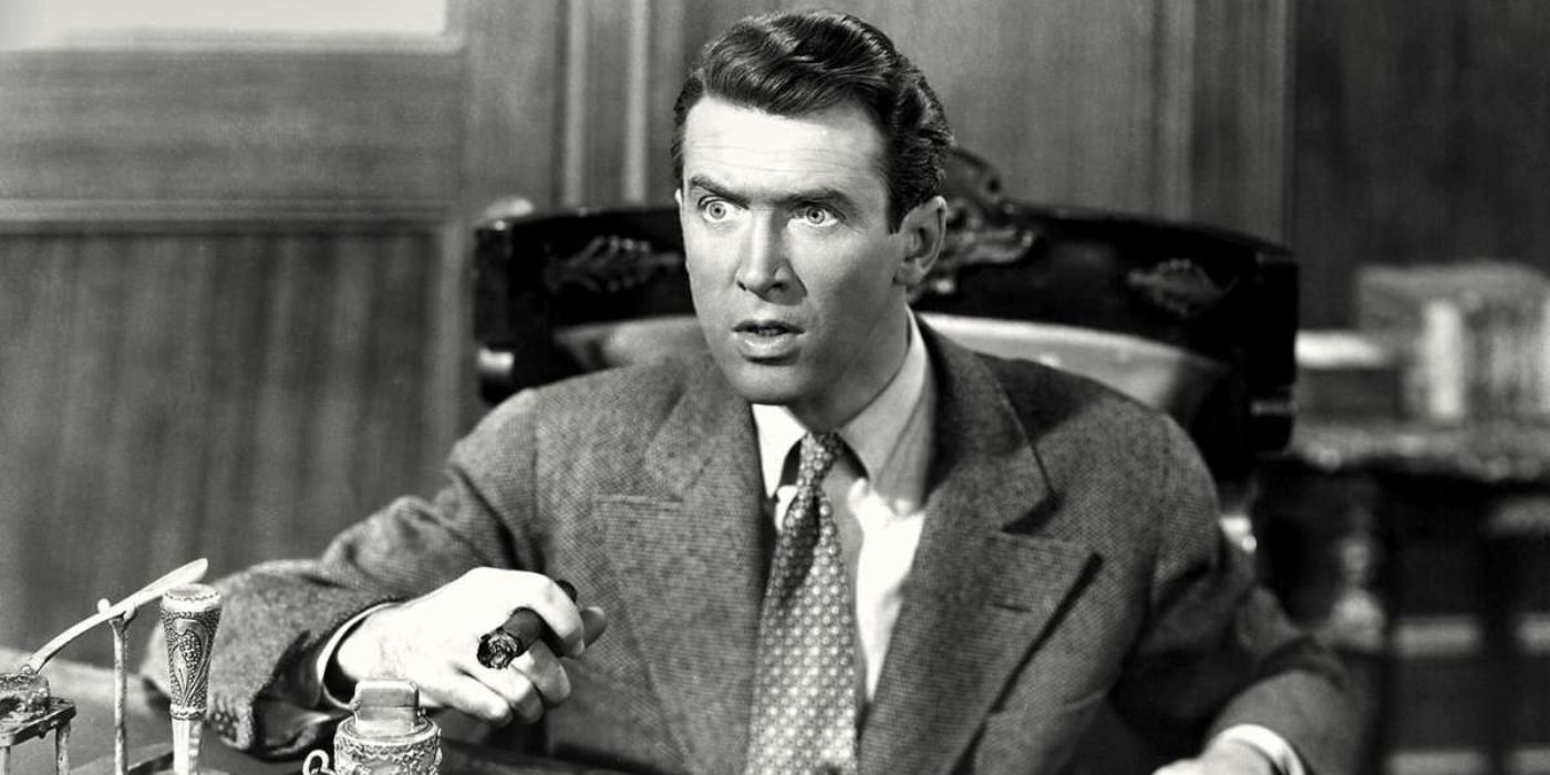 James Stewart as George Bailey looking shocked in It's a Wonderful Life