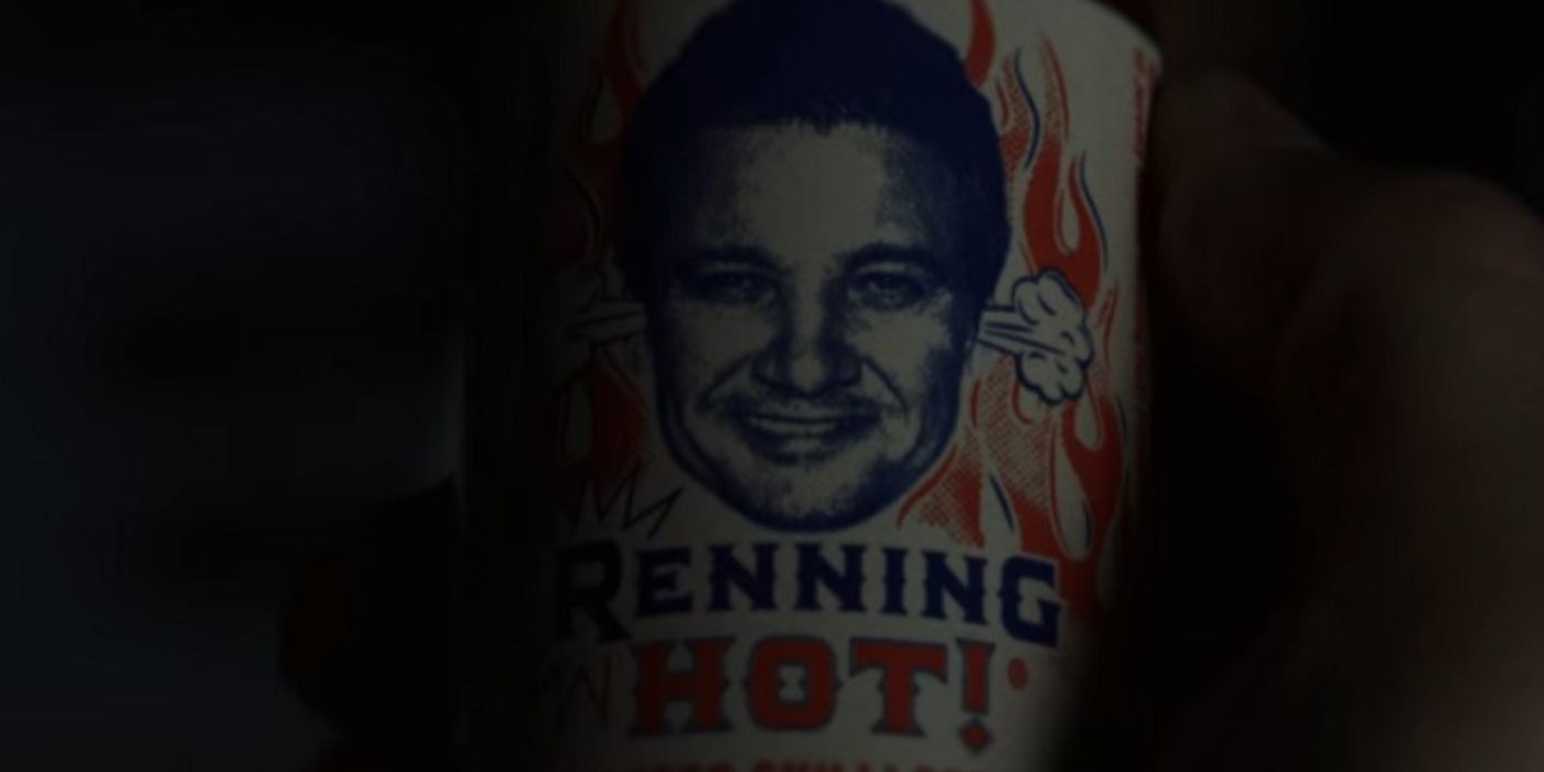 Jeremy Renner smiling on the label for his hot sauce in Glass Onion