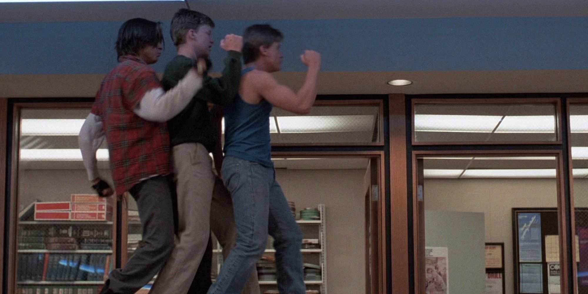 Judd Nelson, Anthony Michael Hall and Emilio Estevez dancing in The Breakfast Club