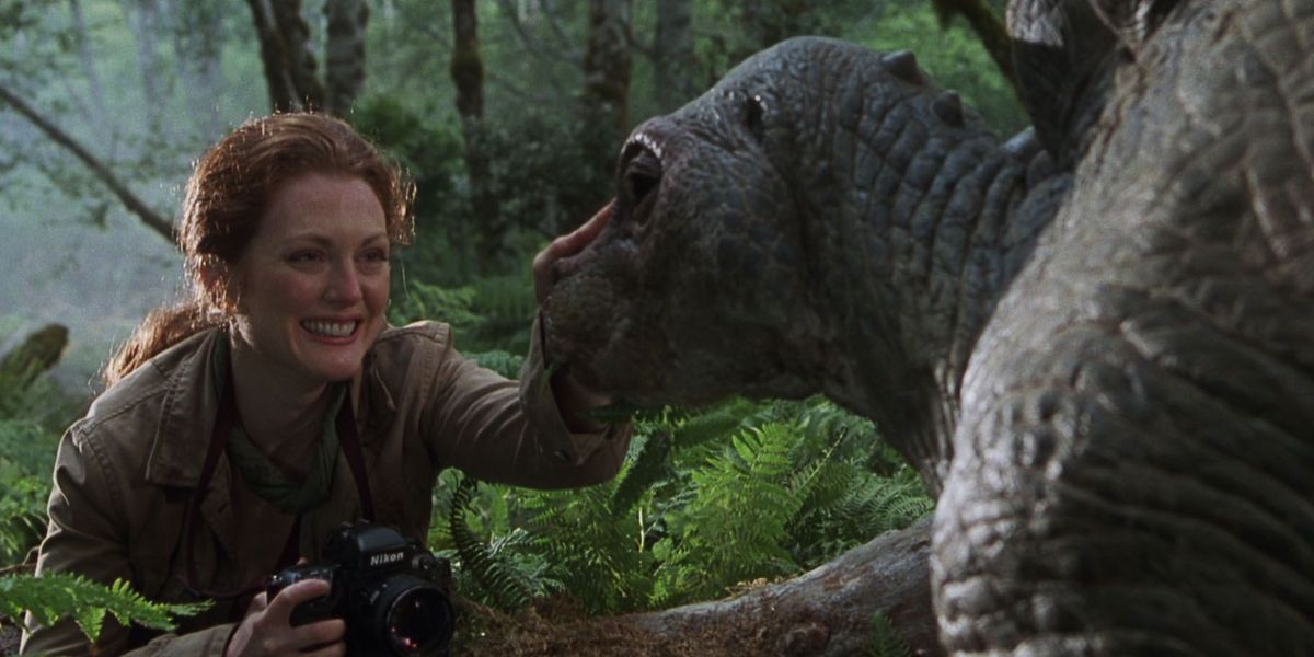 Dr. Sarah Harding petting a dinosaur in The Lost World: Jurassic Park