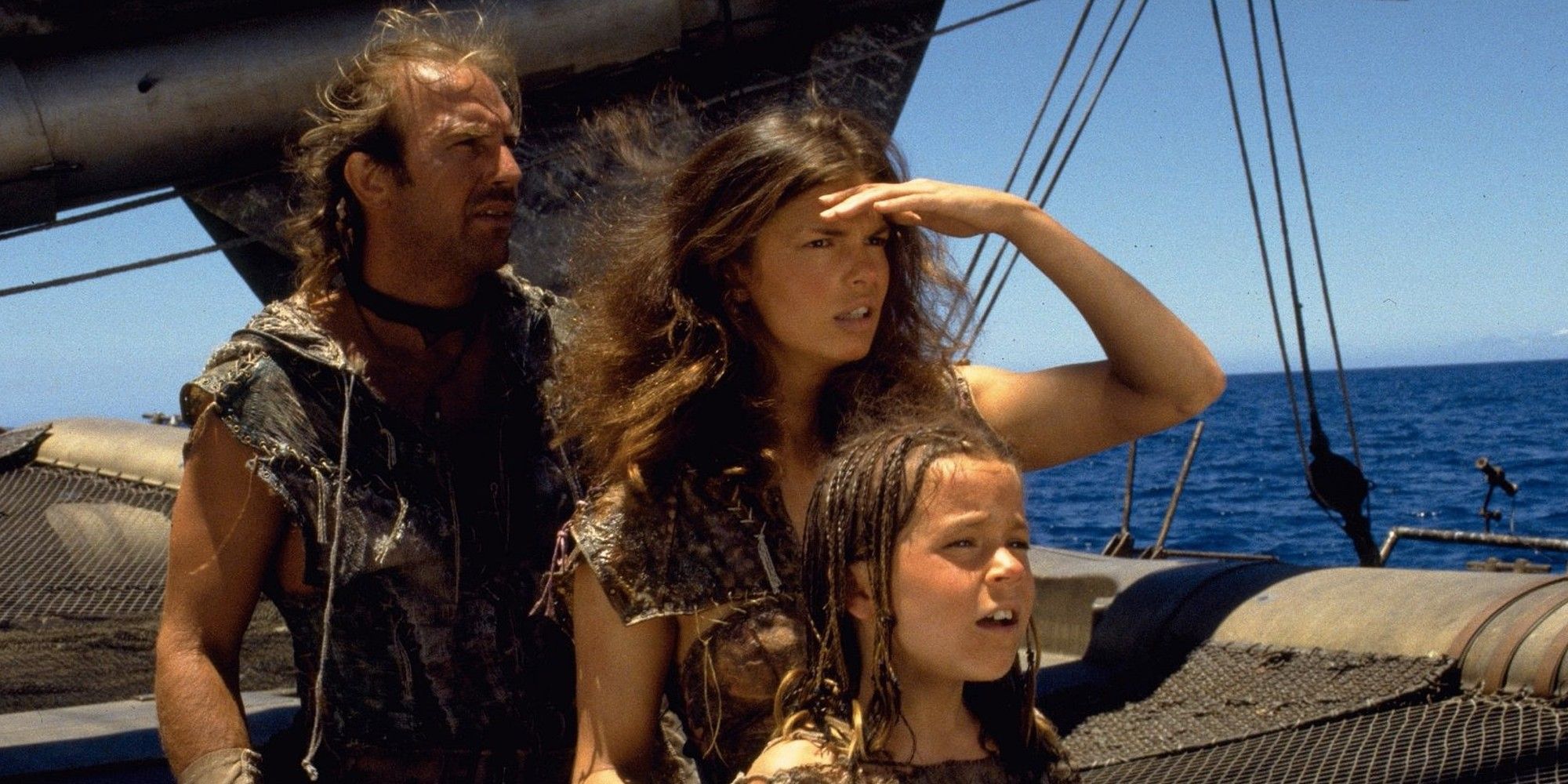 Kevin Costner, Jeanne Tripplehorn, and Tina Majorino in Waterworld (1995)