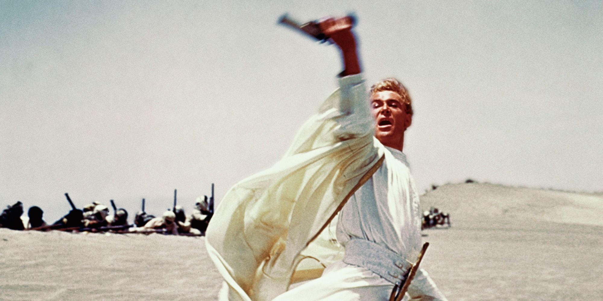 T.S. Lawrence (Peter O'Toole) waving a gun in the desert from Lawrence of Arabia