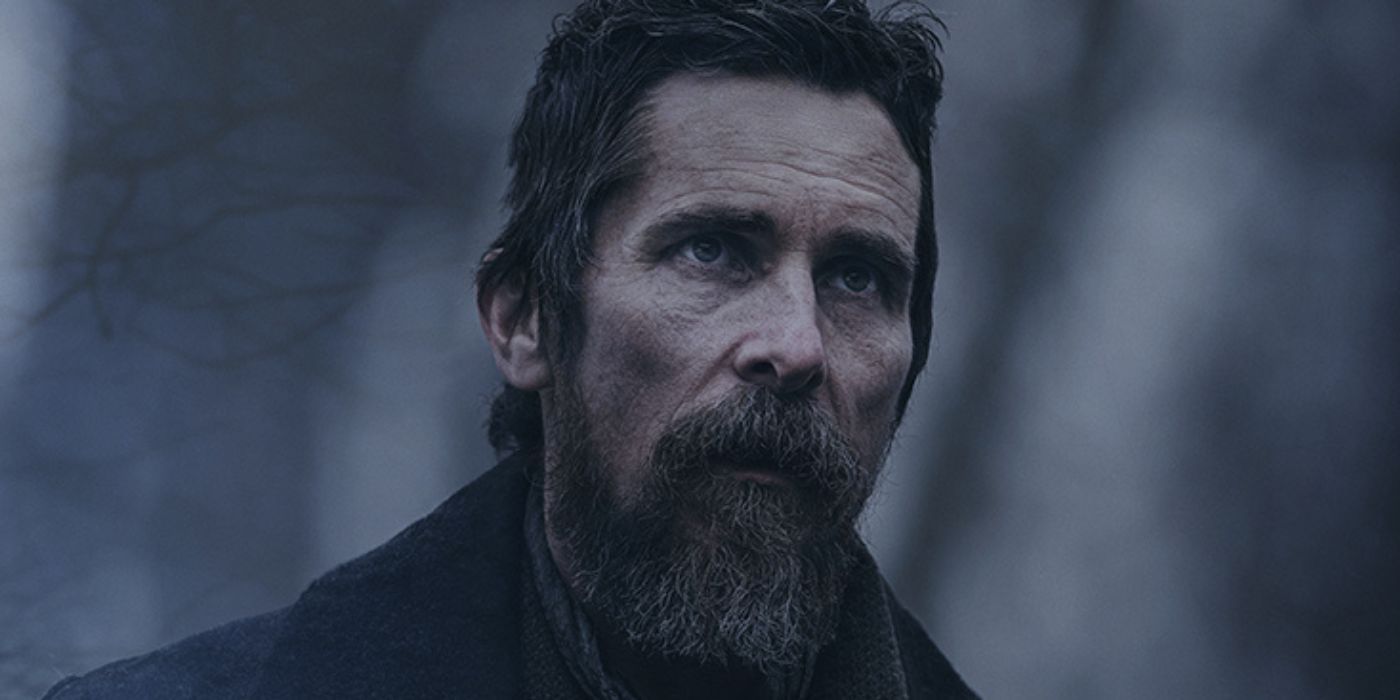 Christian Bale with a beard looks off screen in the poster for The Pale Blue Eye