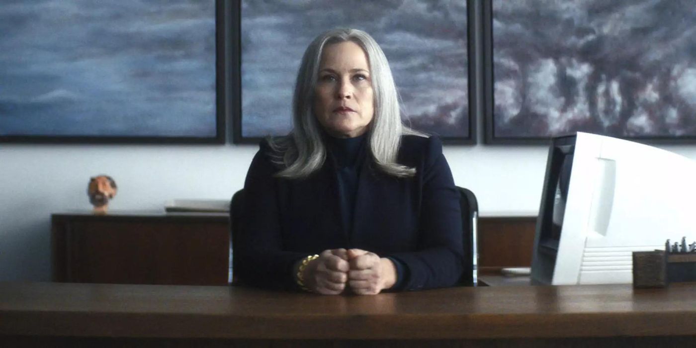 Harmony Cobell looked serious behind her desk in Severance
