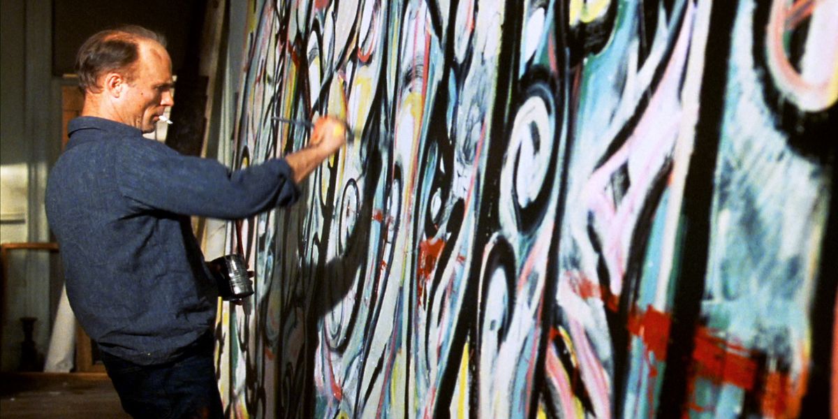 Ed Harris as Jackson Pollock working on a large painting in the film Pollock.