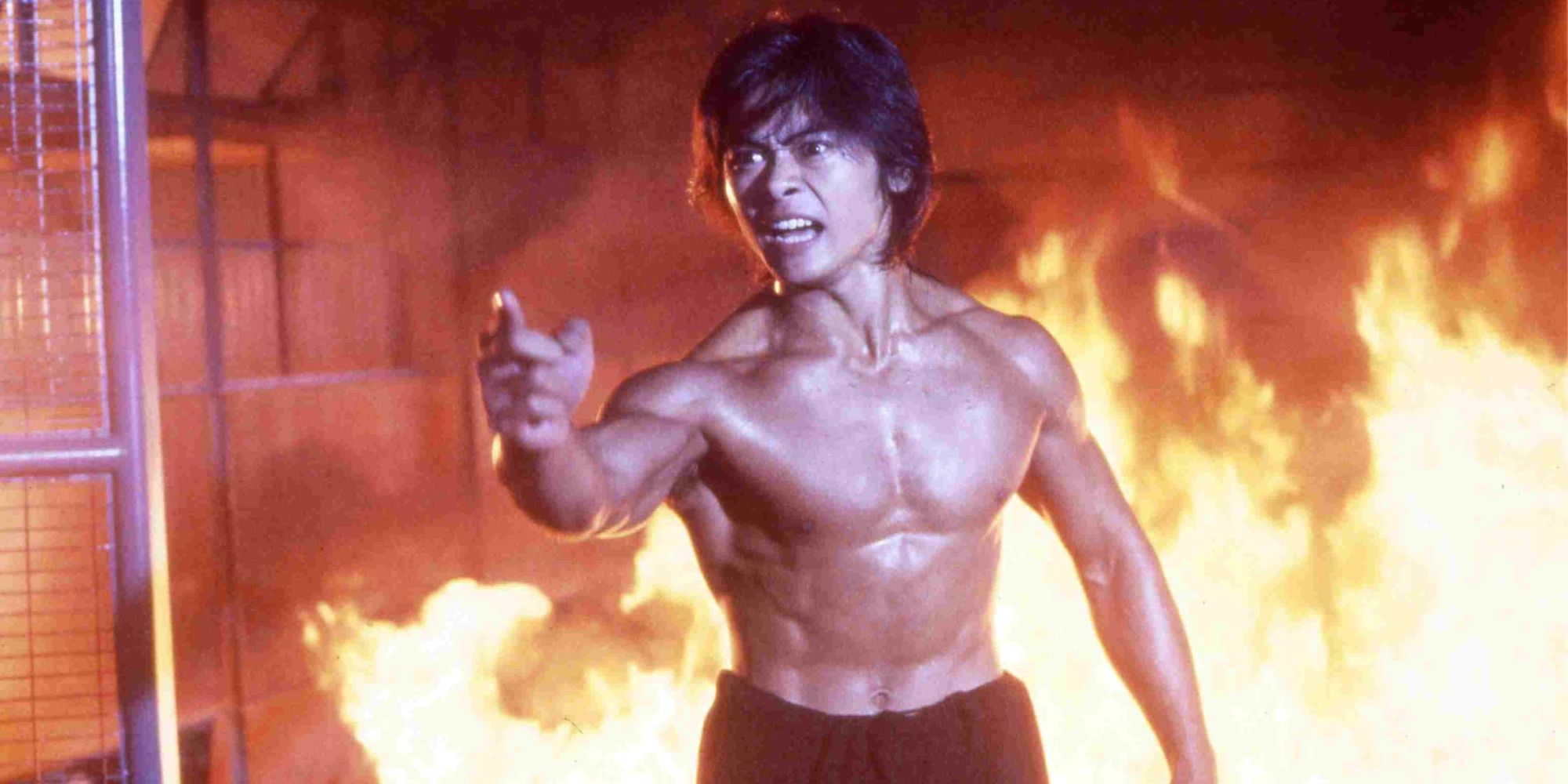 Buff dude angry in a burning room in Riki-Oh_ The Story of Ricky - 1991