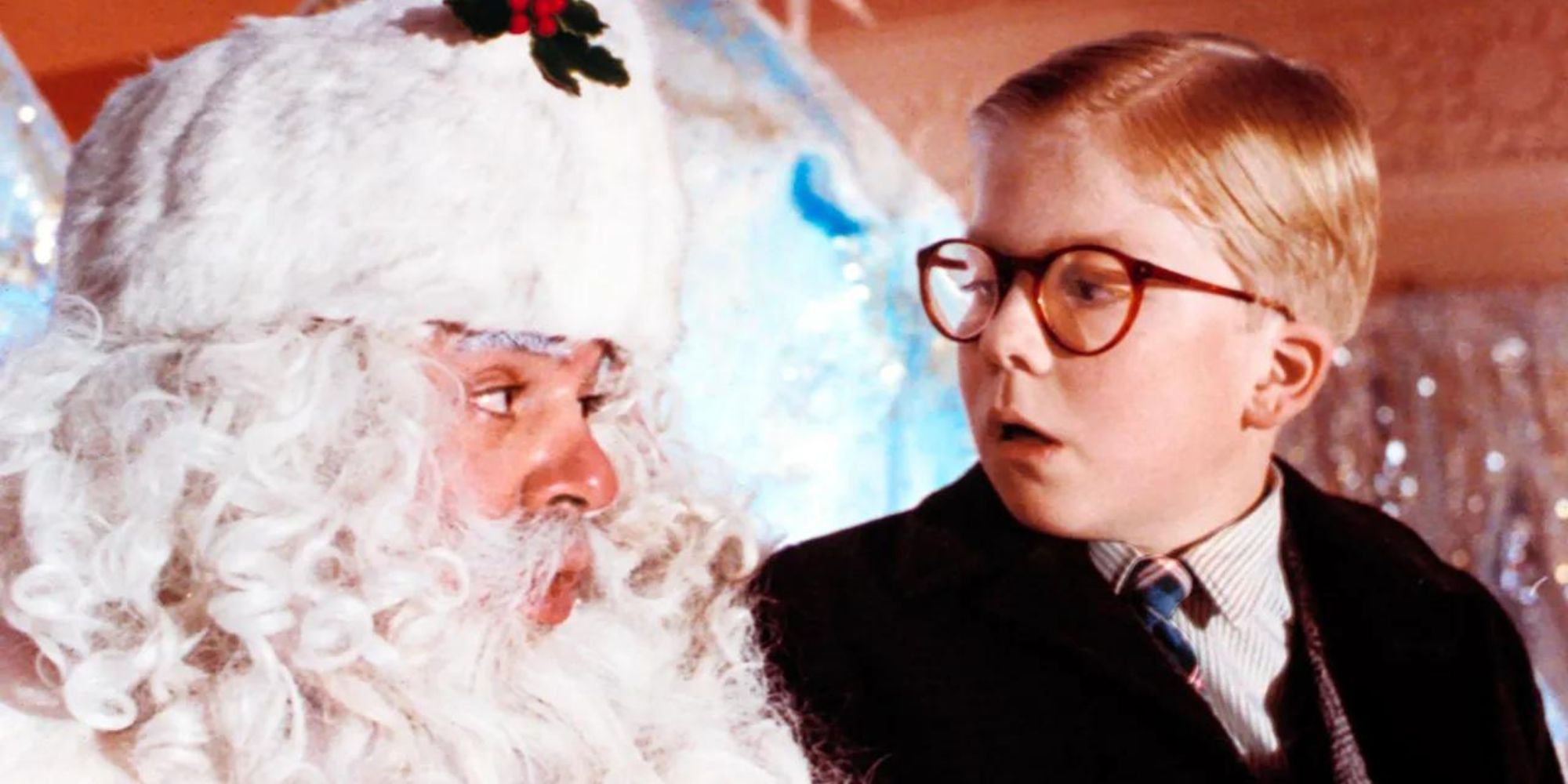 Peter Billingsley as Ralphie and Jeff Gillen as Santa Claus in A Christmas Story.