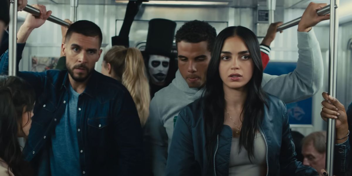 Melissa Barrera, Josh Segarra and Mason Gooding on a subway with the Babadook behind them in Scream VI