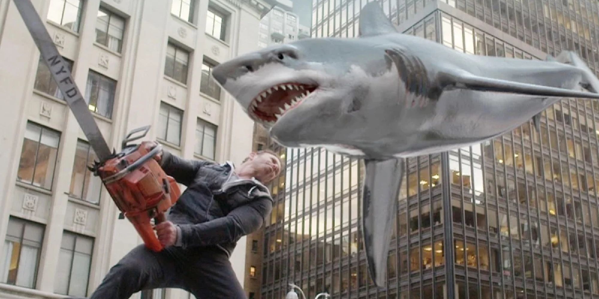 Man with a chainsaw fighting a flying shark in Sharknado - 2013