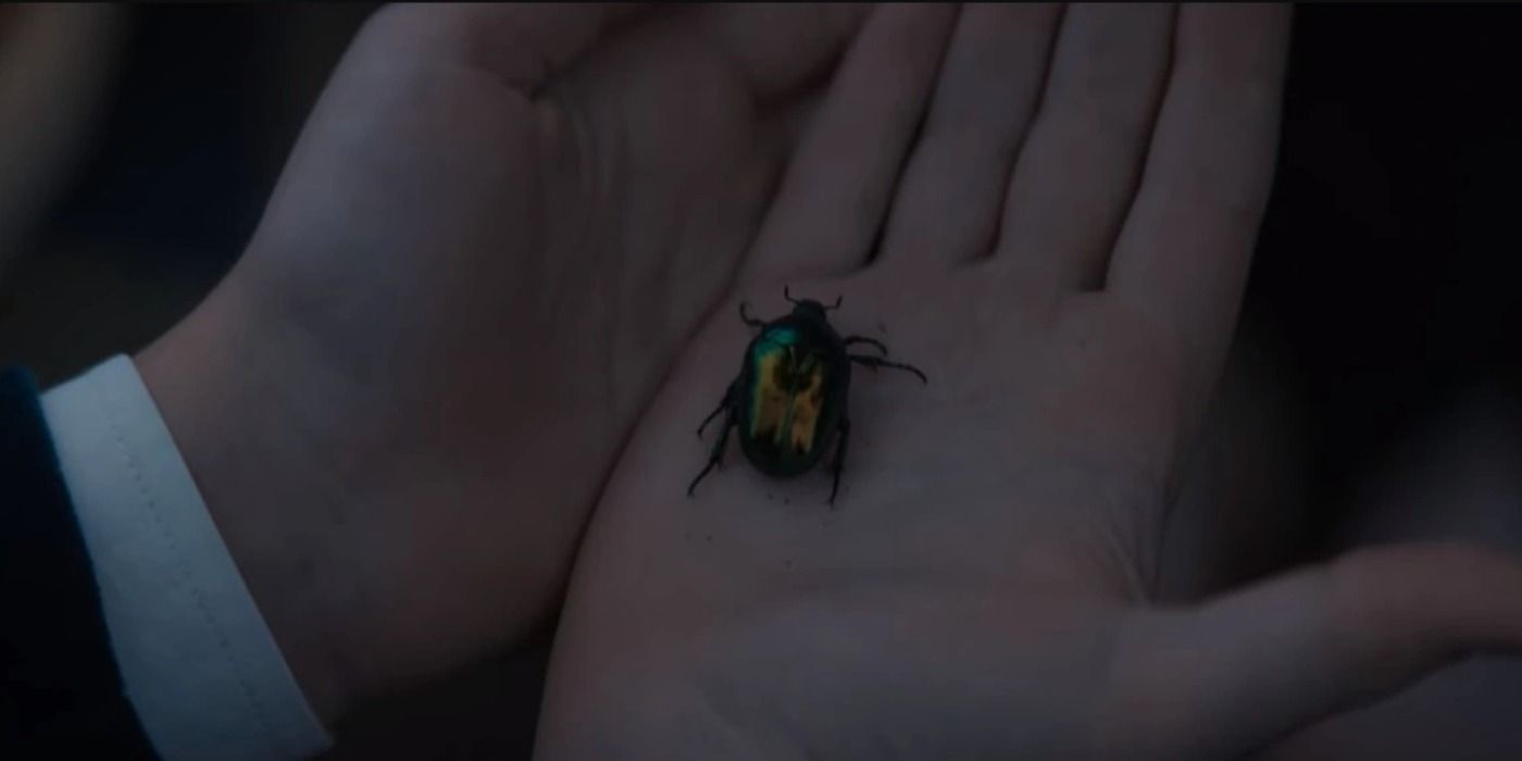 The green bug from '1899' in Elliott's hands
