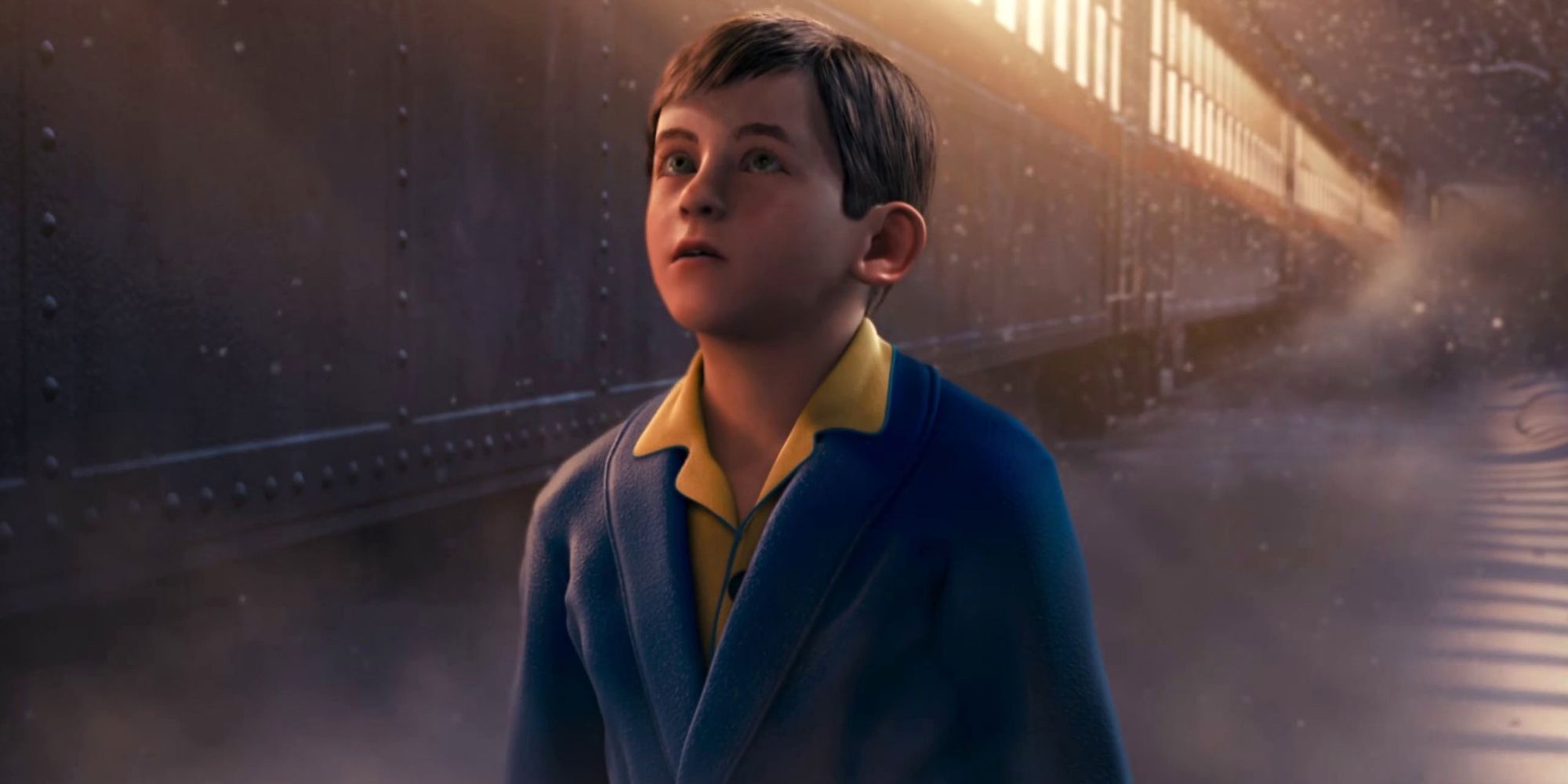 A boy looking at a train in the snow in 'The Polar Express'