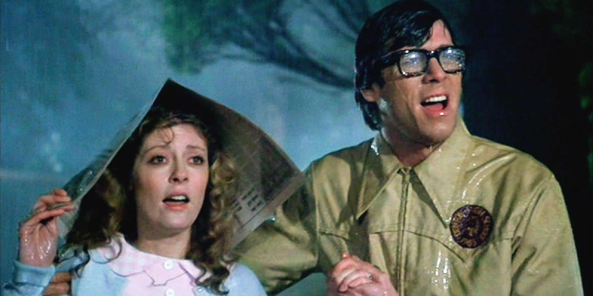 Brad and Janet under the rain in The Rocky Horror Picture Show - 1975