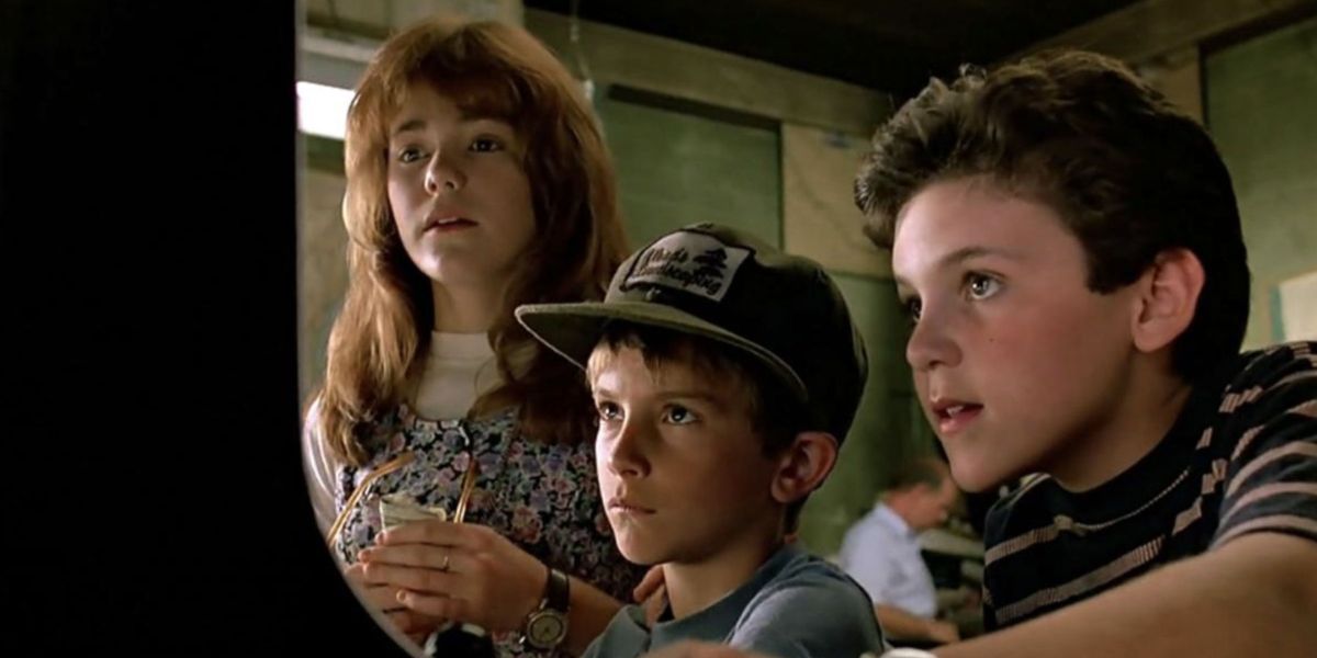 Fred Savage as Corey, Luke Edwards as Jimmy, and Jenny Lewis as Haley playing an arcade game in The Wizard