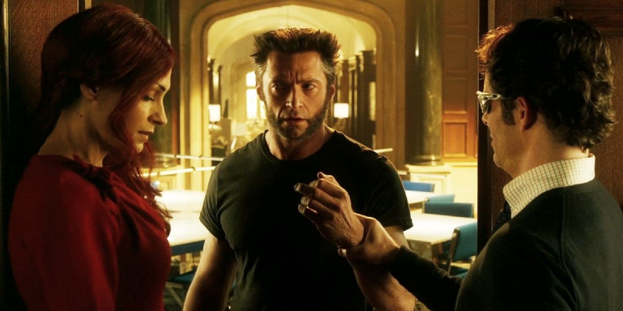 Scott impede Logan de Jean em X-Men: Days of Future Past.