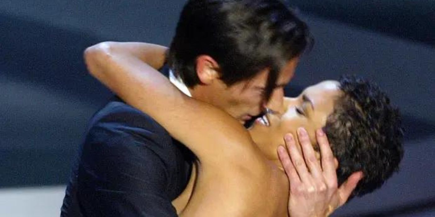Adrien Brody kissing Halle Berry on stage at the Oscars.