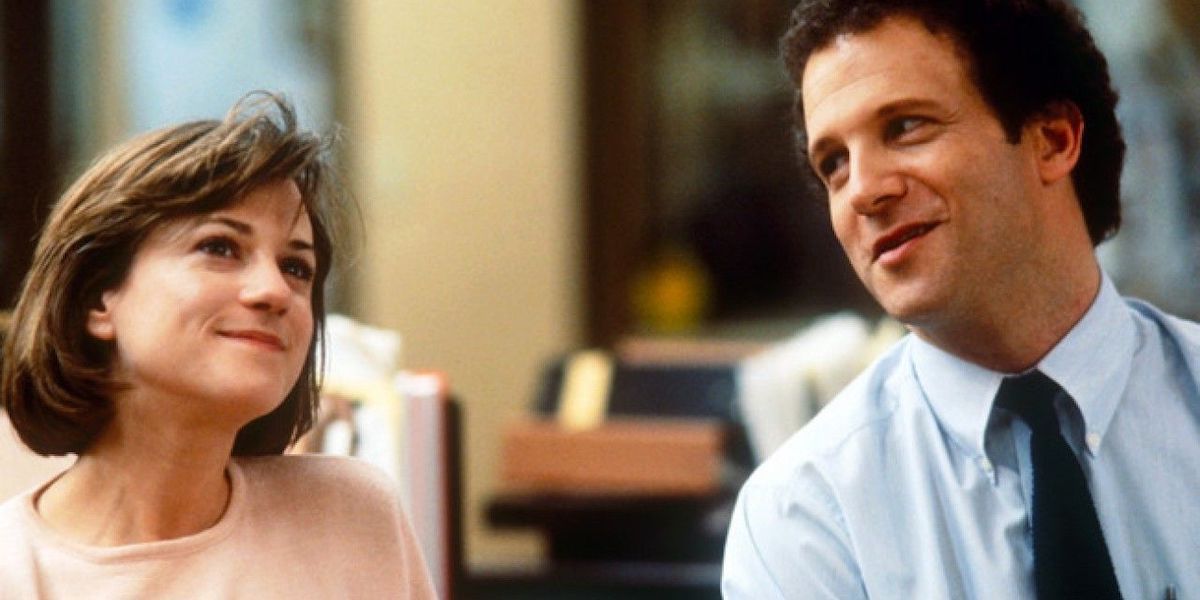 Albert Brooks as Aaron Altman staring at Holly Hunter as Jane Craig in Broadcast News (1987)