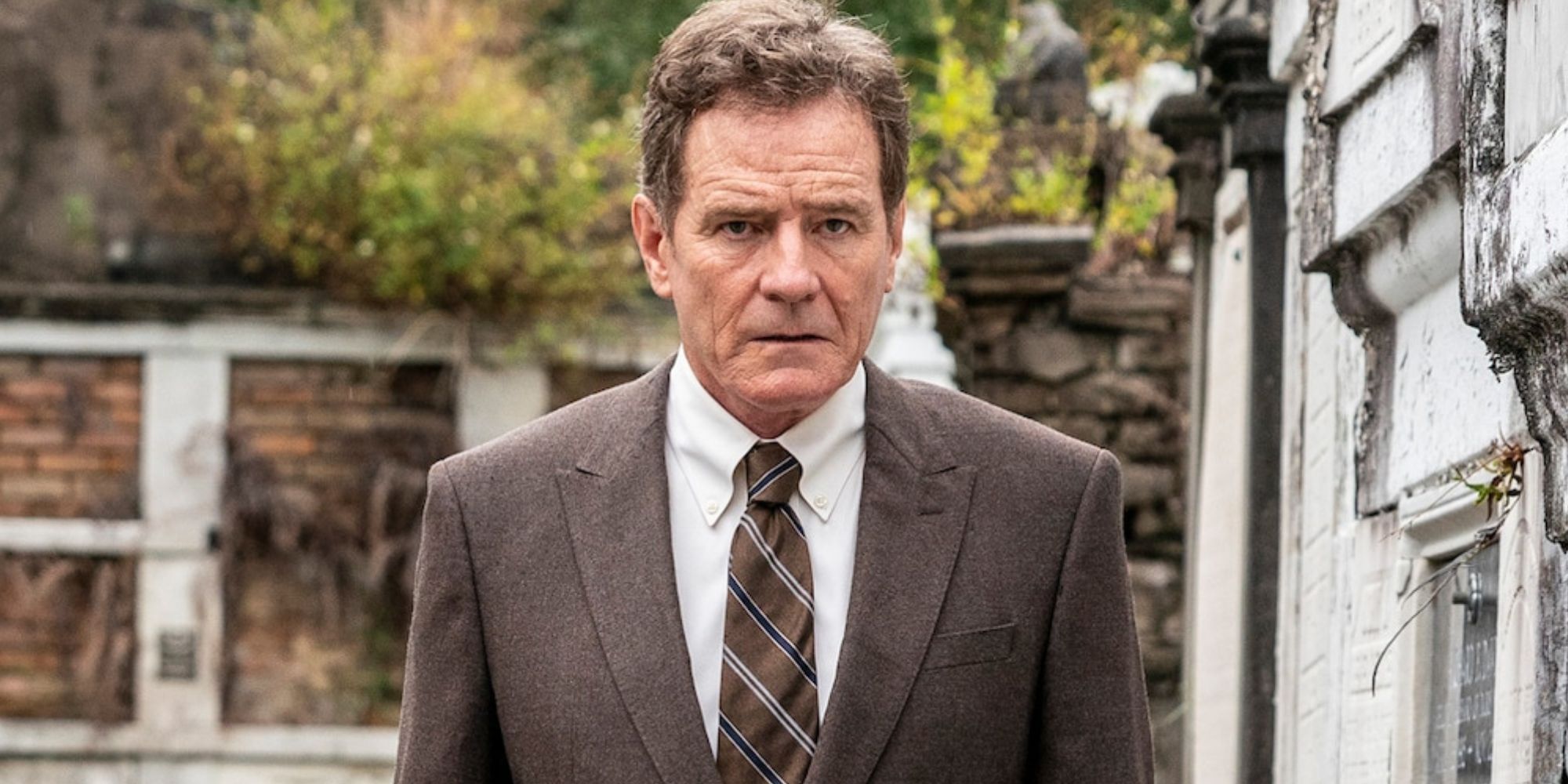 Bryan Cranston walking through a cemetery in Your Honor
