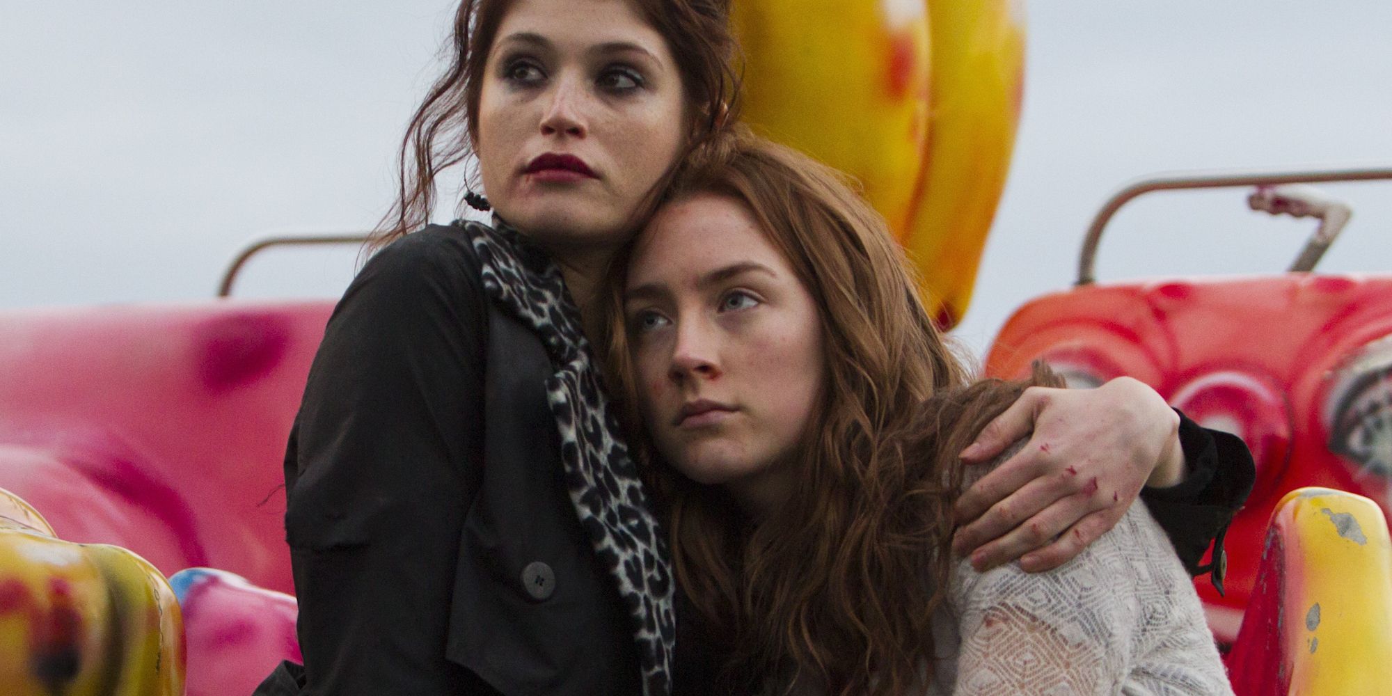 Gemma Arterton as Clara embracing Saoirse Ronan as Eleanor in Byzantium