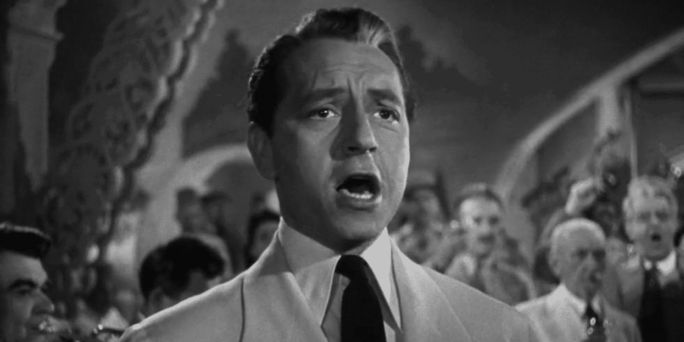 Laszlo, played by Paul Henreid, leading the patrons in song in the famous La Marseillaise scene in 'Casablanca.'