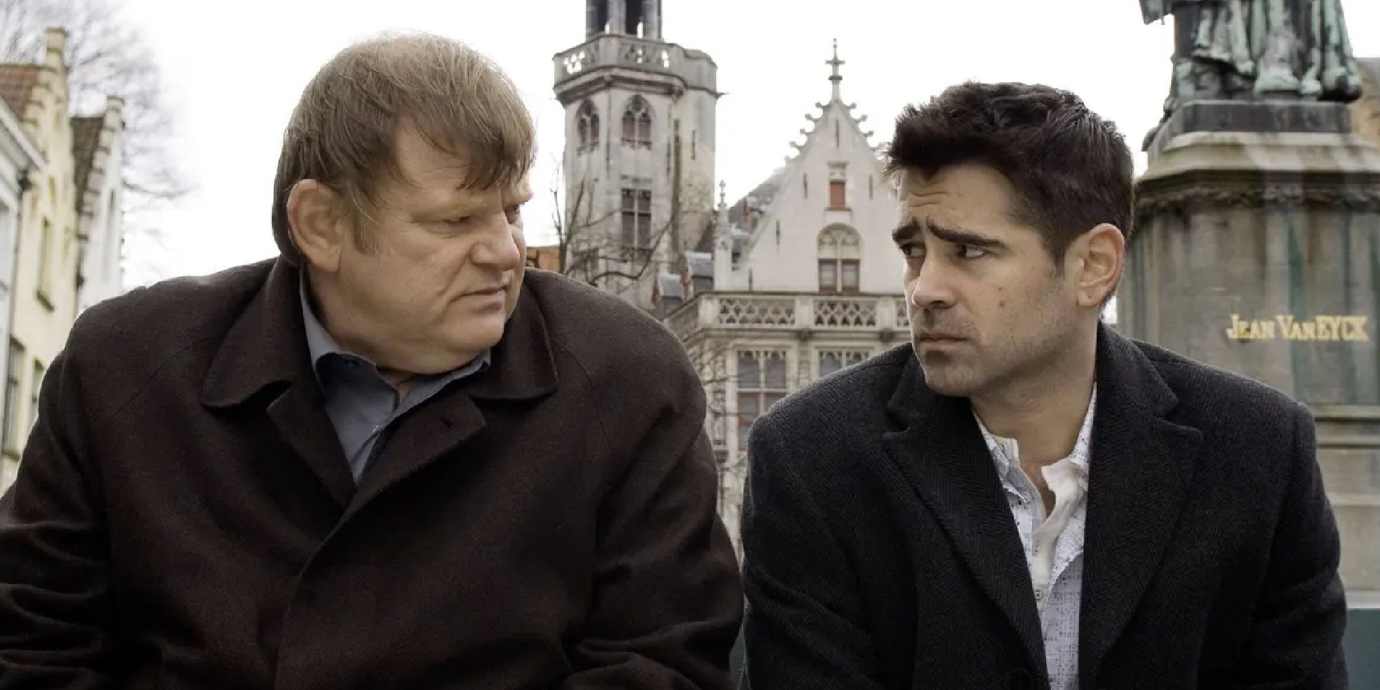 Colin Farrell and Brendan Gleeson sitting together in 'In Bruges'