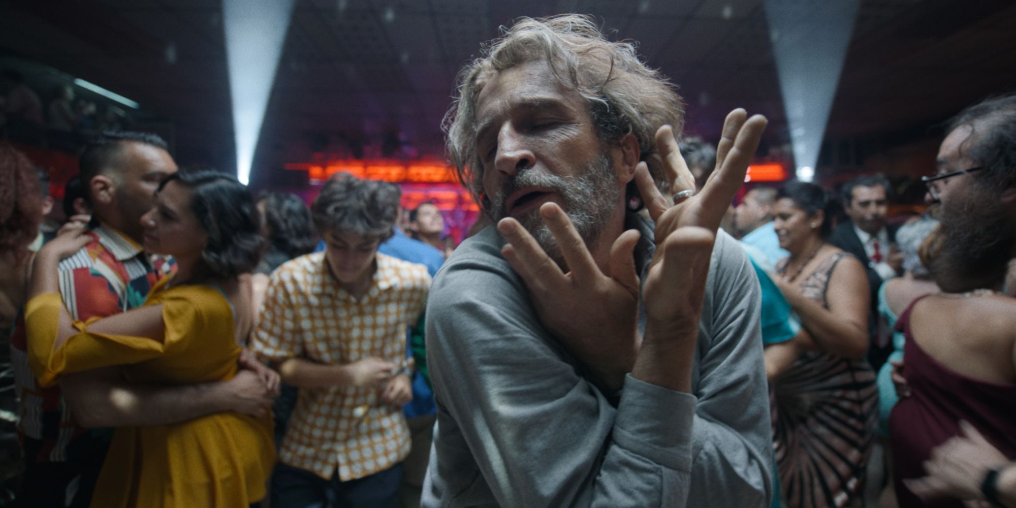 A man dancing at a club in Bardo.